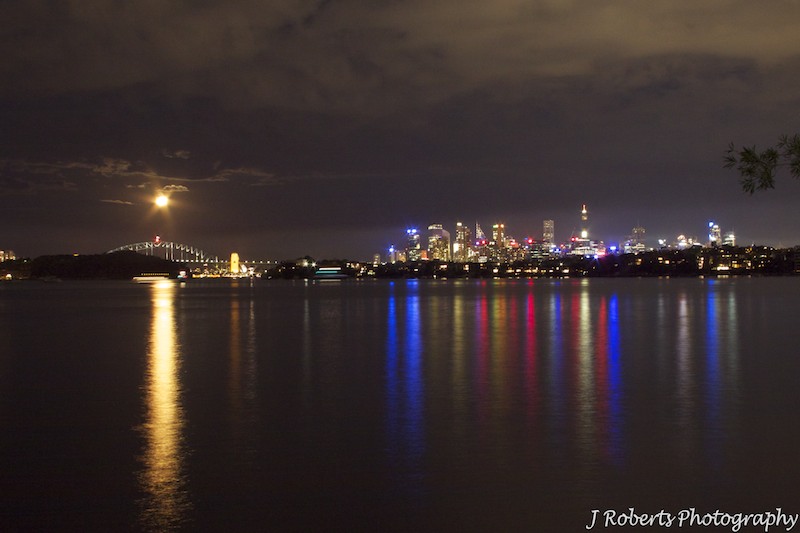 Sydney harbour at night with moon over the bridge - wedding photography sydney